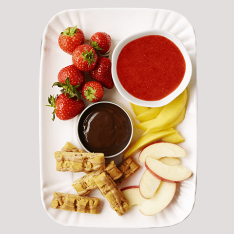 A sharing plate of fruit fondue.