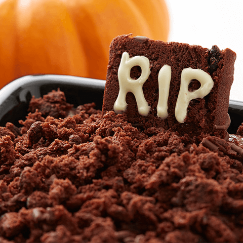 Close up of a pumpkin graveyard pudding.